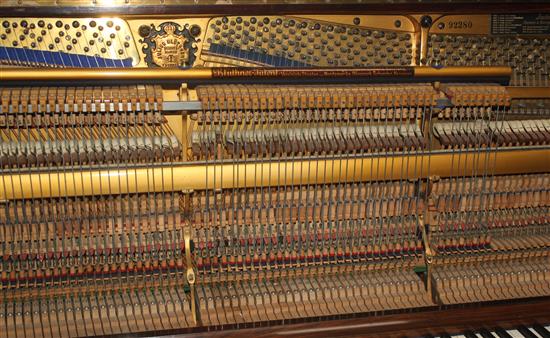 An early 20th century Bluthner rosewood cased upright piano,